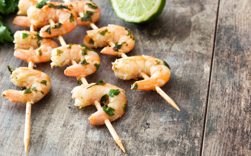 Multiple pieces of shrimp, skewered