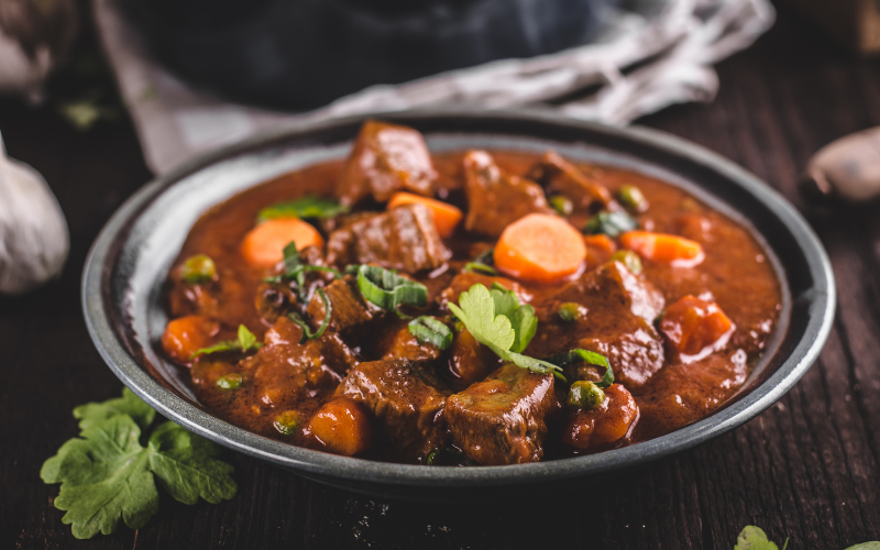 Beef and vegetable stew in a bowl, ready for halloween meals